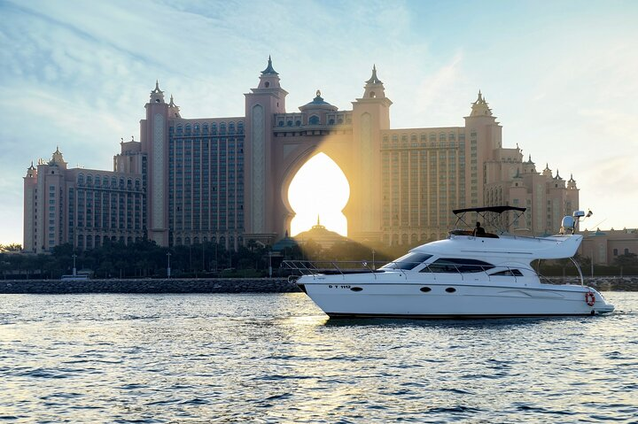Experience the elegance of Dubai's skyline from the shimmering waters with luxury yachts offering stunning views of iconic landmarks like Atlantis. Perfect for unforgettable gatherings and celebrations.